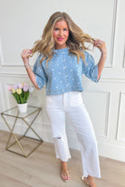 Polka dot denim top by PEACH LOVE featuring a stylish design, perfect for casual or dressy occasions.