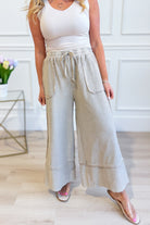 EASEL Caris Mineral Washed Upside Down Terry Knit Wide Leg Palazzo Pants in neutral fabric, shown from front view.