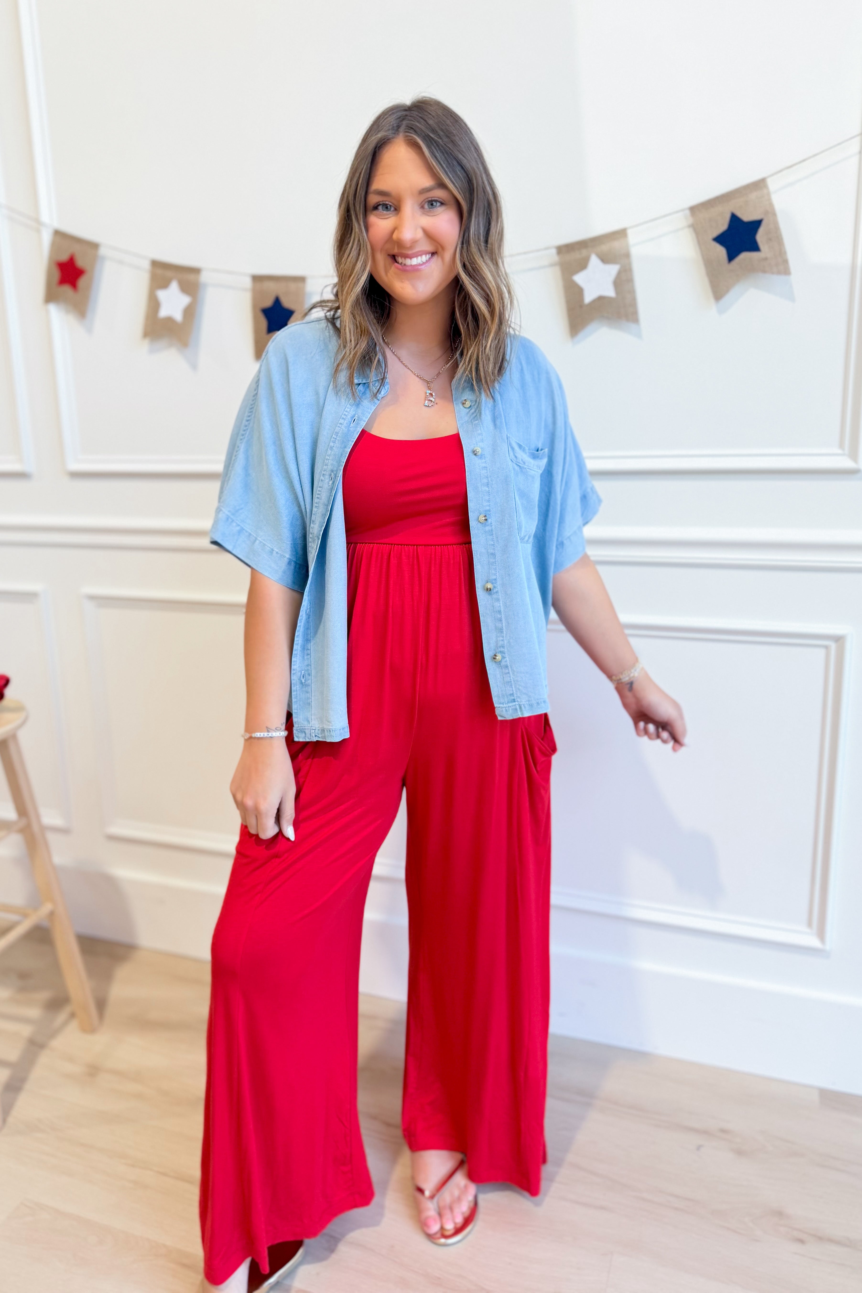 Rae Mode Linny casual sleeveless wide-leg jumpsuit, featuring a relaxed fit and stylish design, displayed on a hanger.
