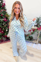 Mary Square Winter Pines pajama set with Charlotte Tree Farm print, featuring a long-sleeve top and 156 pants