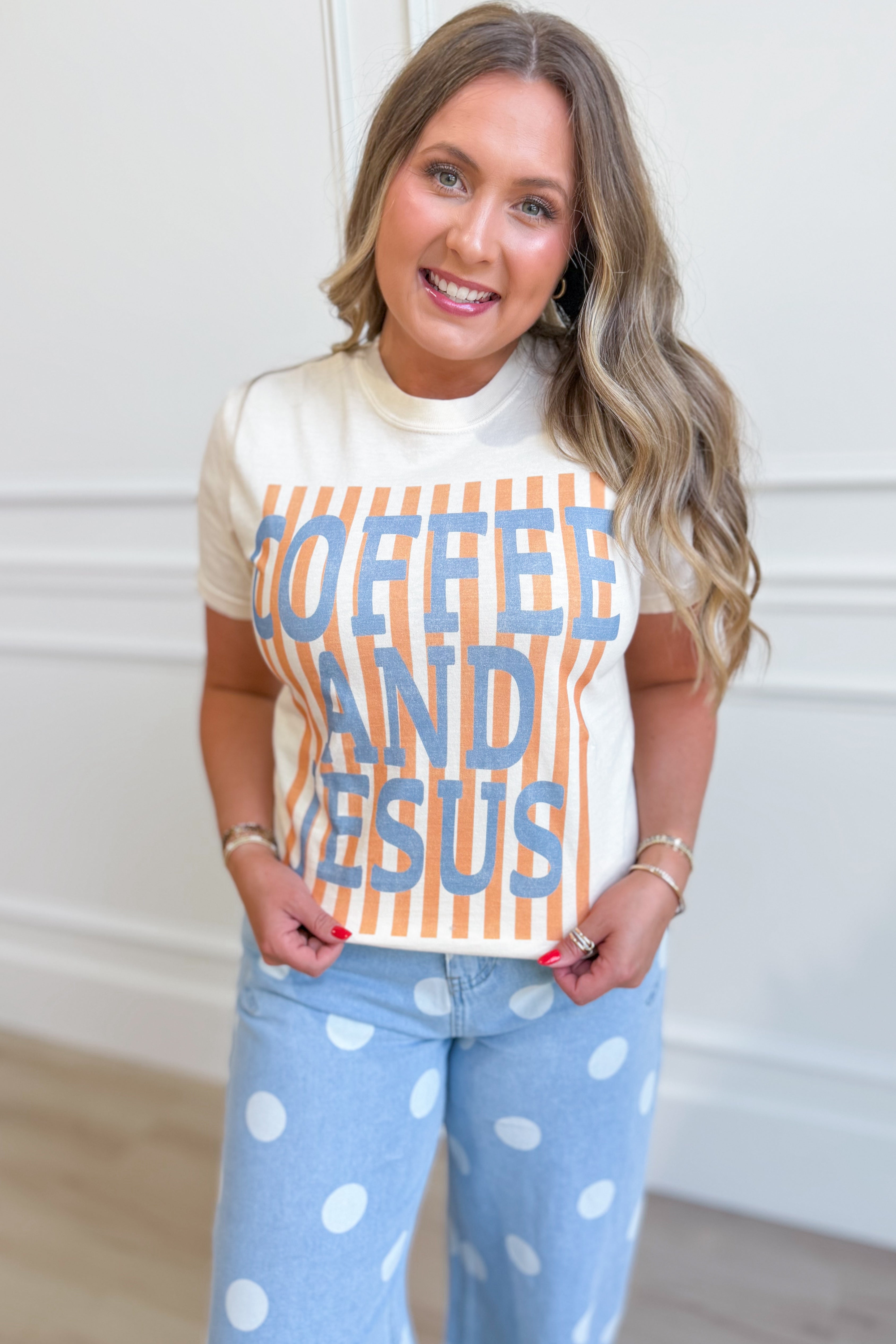 Worthy Wear Coffee and Jesus graphic T-shirt featuring a stylish design with coffee cups and religious imagery on a casual tee.
