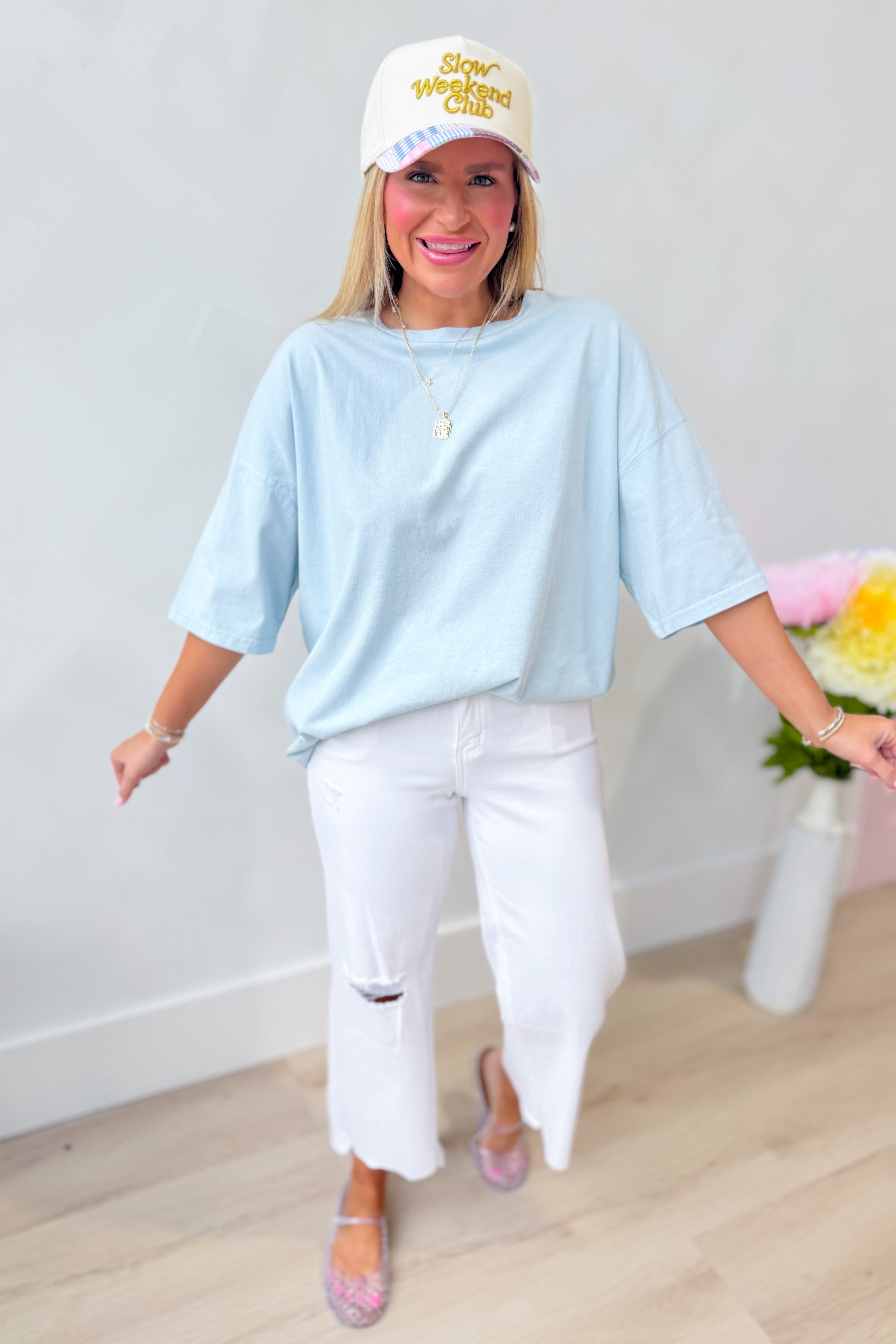 PEACH LOVE Cody blue solid relaxed casual top, basic 105 style, featuring a loose fit and short sleeves, on a flat lay.