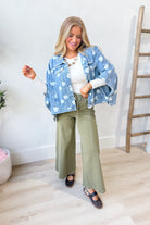 TWENTIFOURTH Otis Polka Dot Cape Button Down Jacket, 140 Outerwear with polka dot pattern and button details, shown on a hanger.