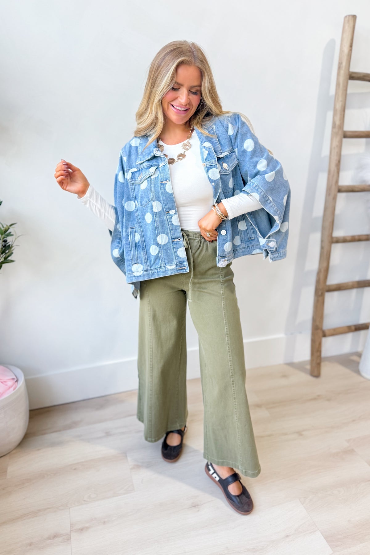 TWENTIFOURTH Otis Polka Dot Cape Button Down Jacket, 140 Outerwear with polka dot pattern and button details, shown on a hanger.