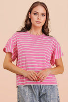 Pamela Pink Ruffle Sleeve Top by VERY J, casual women's top with ruffled sleeves and soft fabric, shown on a hanger.