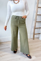 EE:SOME Romeo Dry Herb Mineral Washed Tie Waist Leg Pants, 156 Pants in natural fabric with a relaxed fit and tie waist detail.