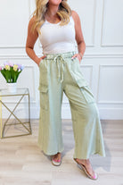 EASEL Mateo Mineral Washed Wide Leg Cargo Pants, beige color, relaxed fit with multiple cargo pockets on 156 pants.