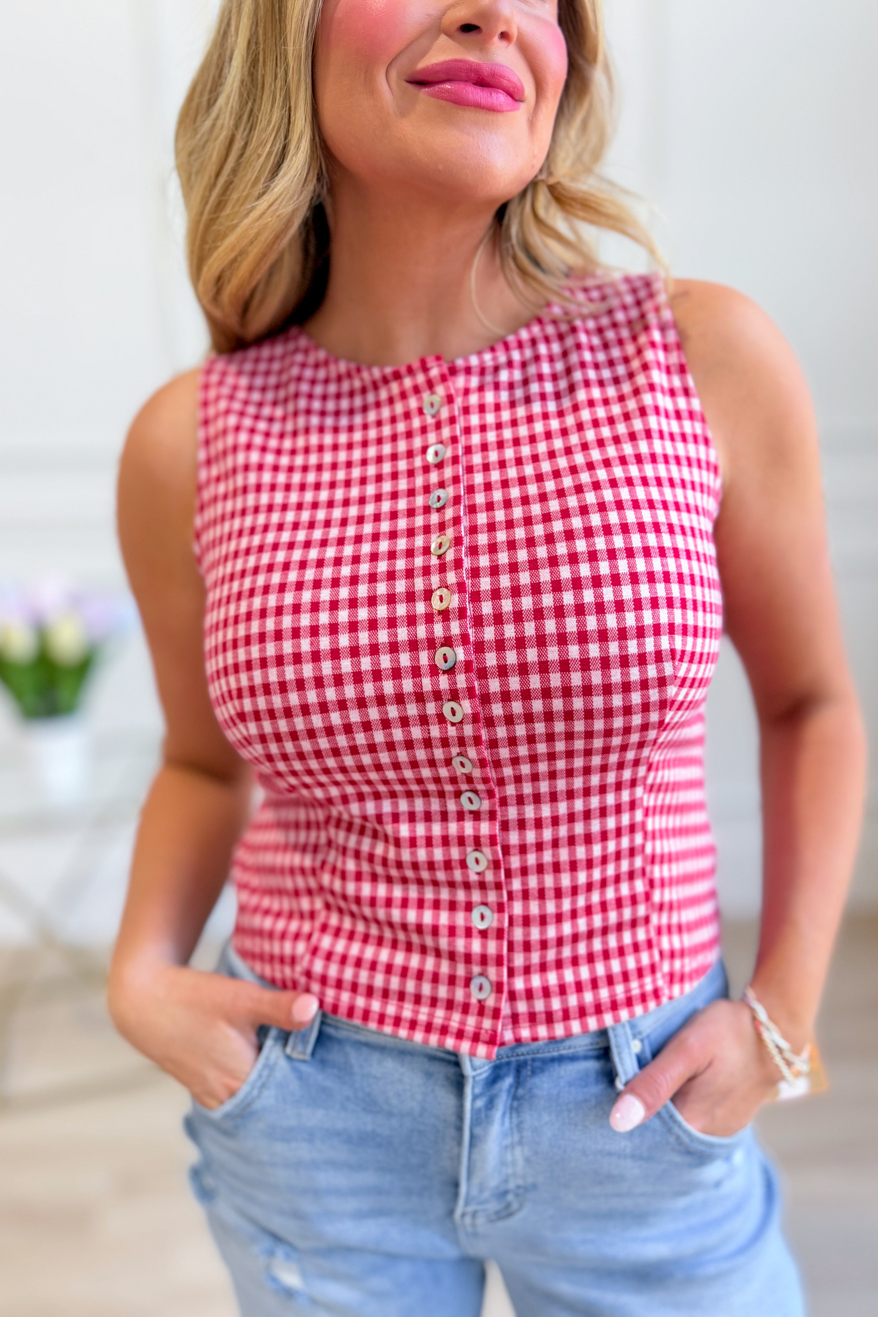 EE:SOME Mary Gingham printed top, a stylish dressy blouse with a classic gingham pattern and long sleeves, perfect for chic occasions.