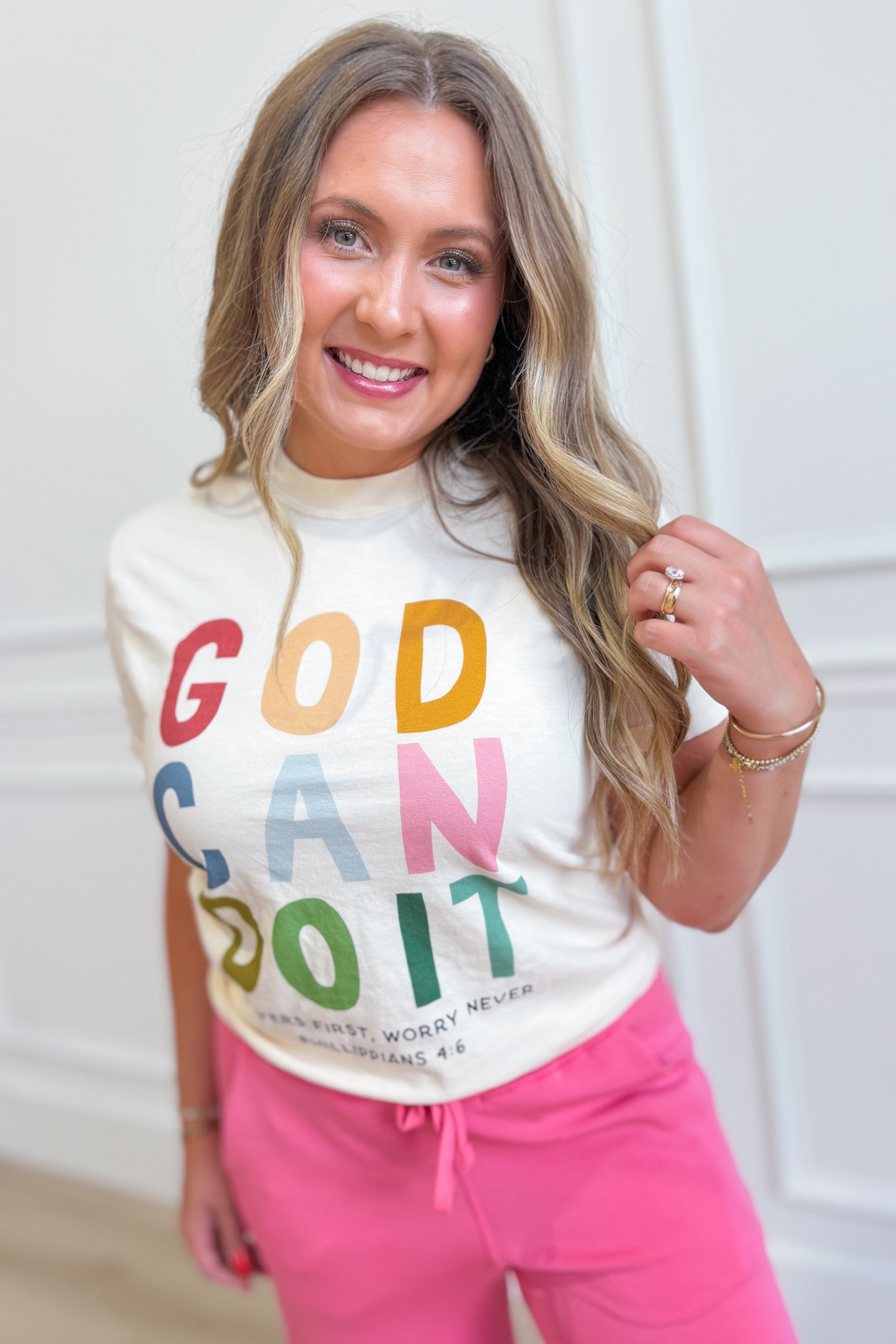 Poppy & Pine God Can Do It graphic T-shirt featuring a bold print with inspirational message on a casual crew neck tee.