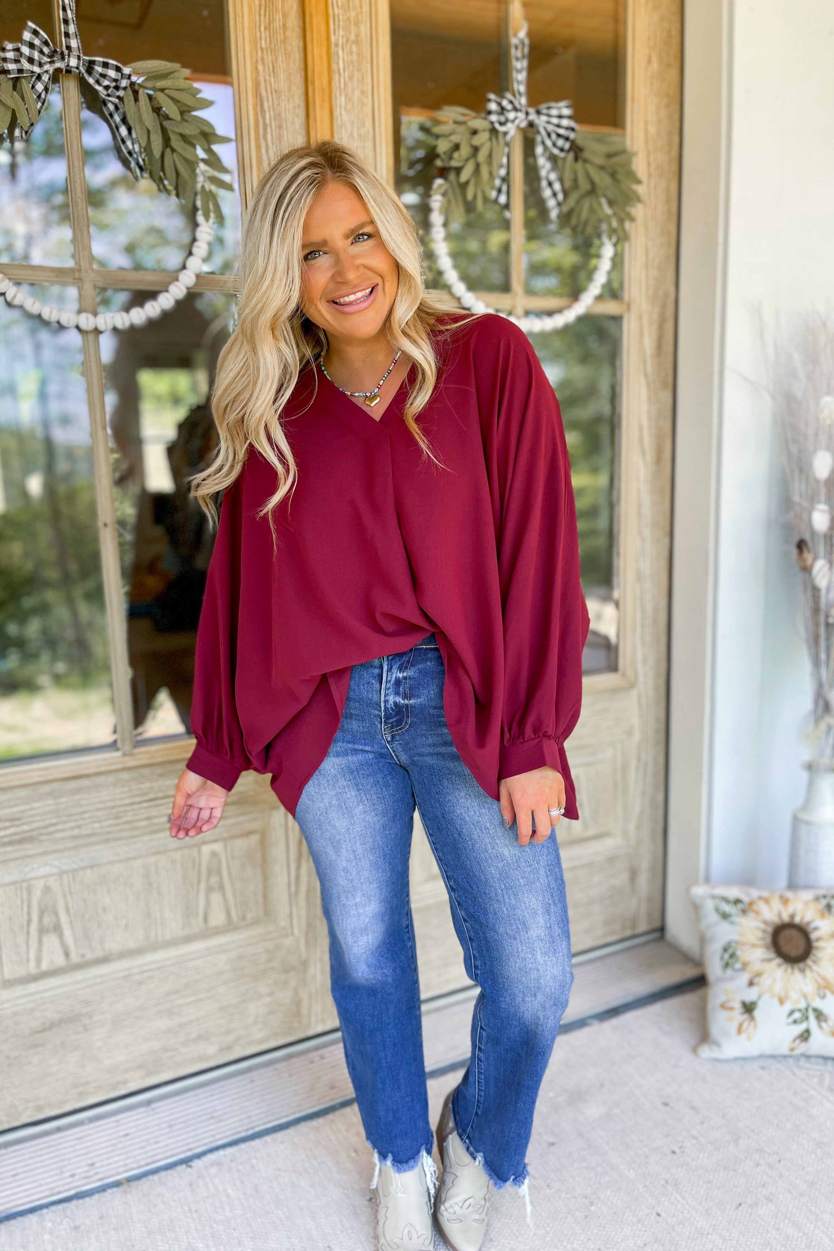 red flowy blouse