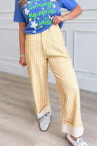 Luis Lt Yellow Gingham Rolled Hem Barrel Pant from PEACH LOVE, featuring a bright yellow gingham pattern and relaxed fit.