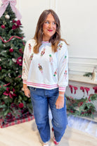 Mary Square Millie Nutcracker sequin pullover sweatshirt with festive nutcracker graphic and sparkling details