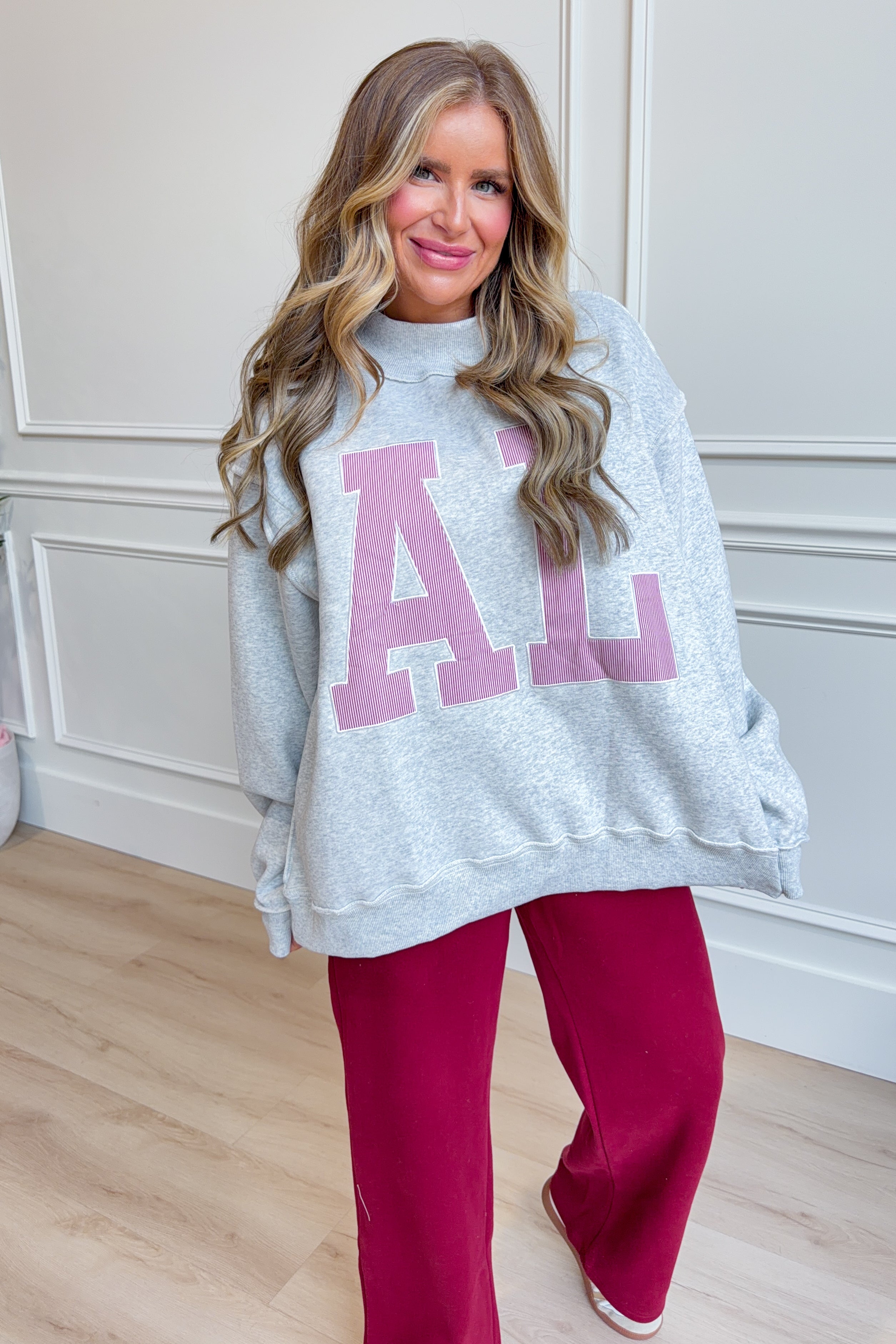 Alabama Mock Neck Embroidered Sweatshirt by BUCKET LIST featuring a mock neck and embroidered design on a 137 graphic sweatshirt.