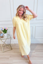 UMGEE USA Tonya plaid printed midi dress featuring a stylish, dressy design with a fitted waist and flared hem.