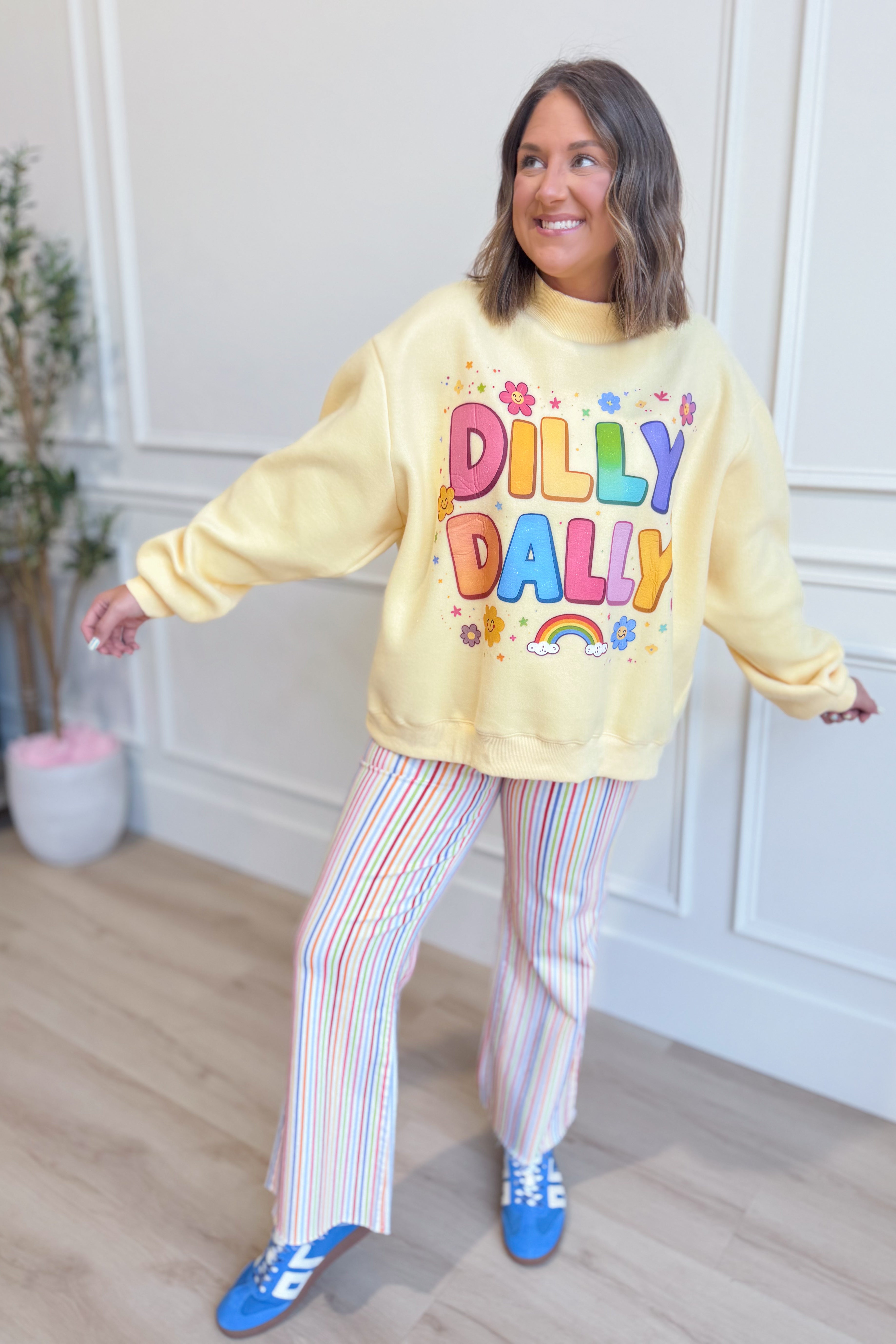 Rainbow reversible mock neck sweatshirt from BUCKET LIST's Dilly Dally 137 Graphic Sweatshirts collection, featuring colorful rainbow design.