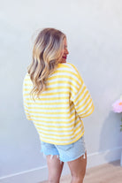 Yellow striped button-down cardigan top from BAEVELY, featuring a 131 spring sweater design with a casual, cozy fit.