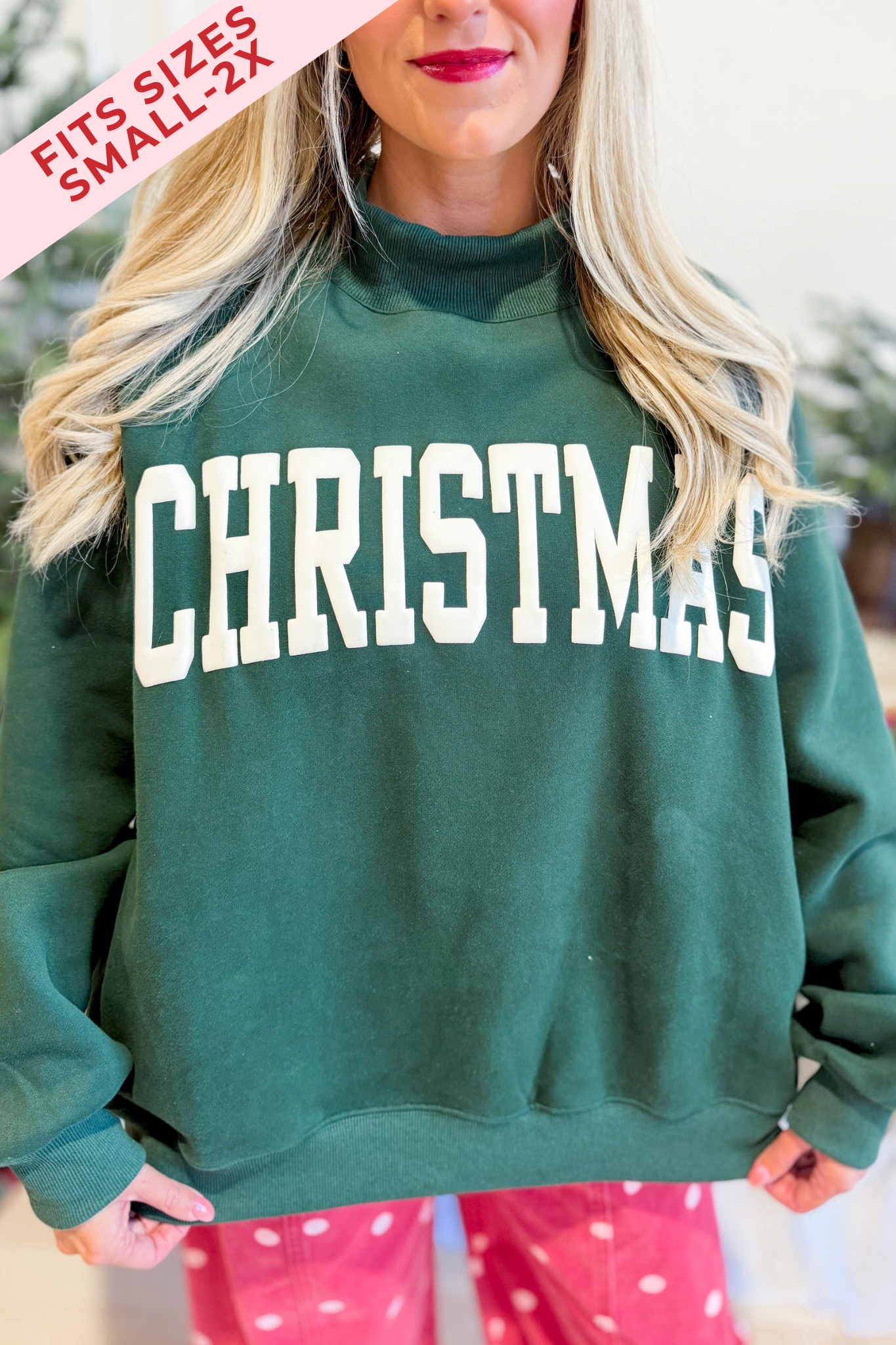 Red Christmas mock neck sweatshirt from BUCKET LIST's 137 Graphic Sweatshirts collection, featuring festive holiday design.