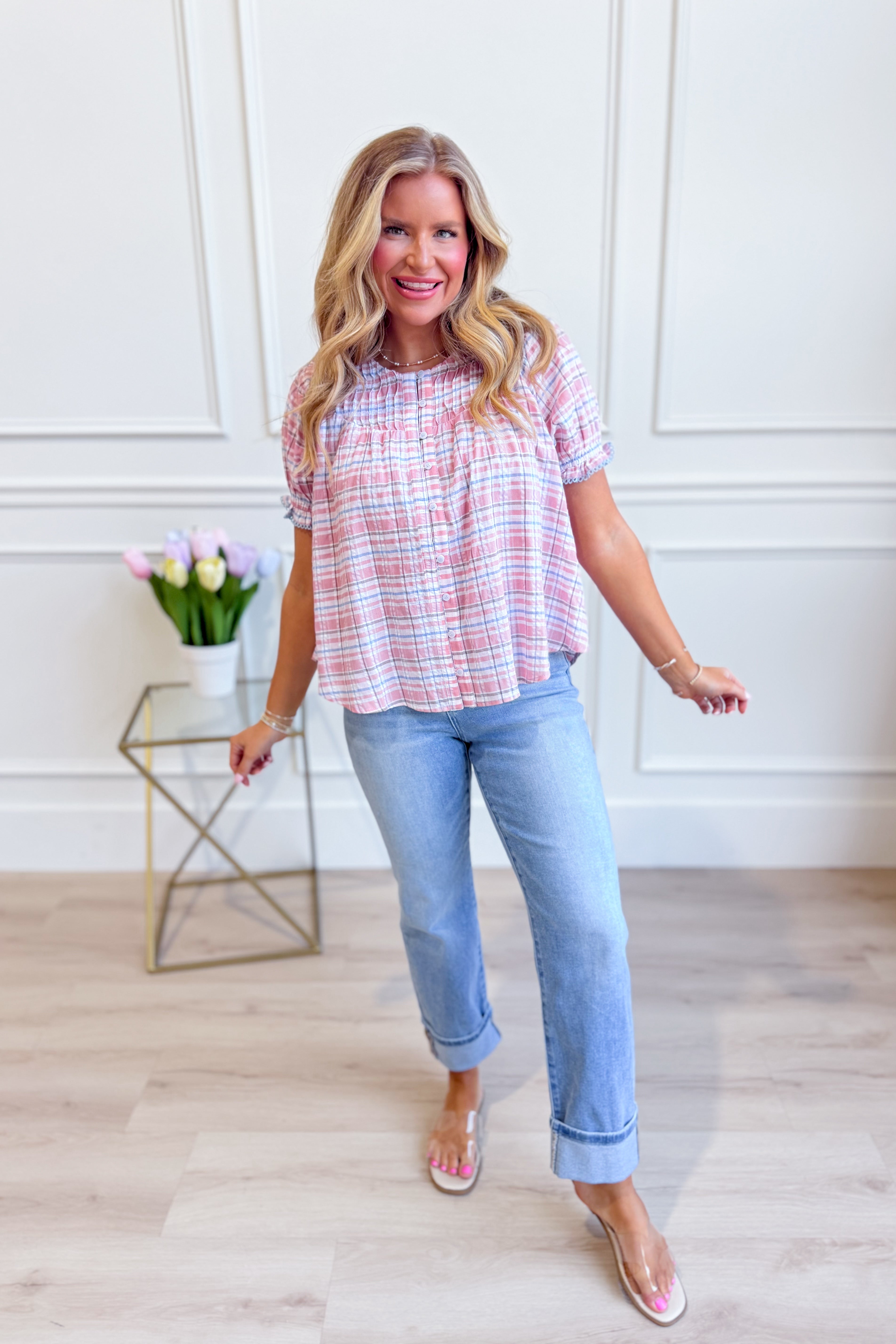 Petunia plaid button-down blouse by EE:SOME, a stylish 110 dressy top featuring a classic plaid pattern and button front.
