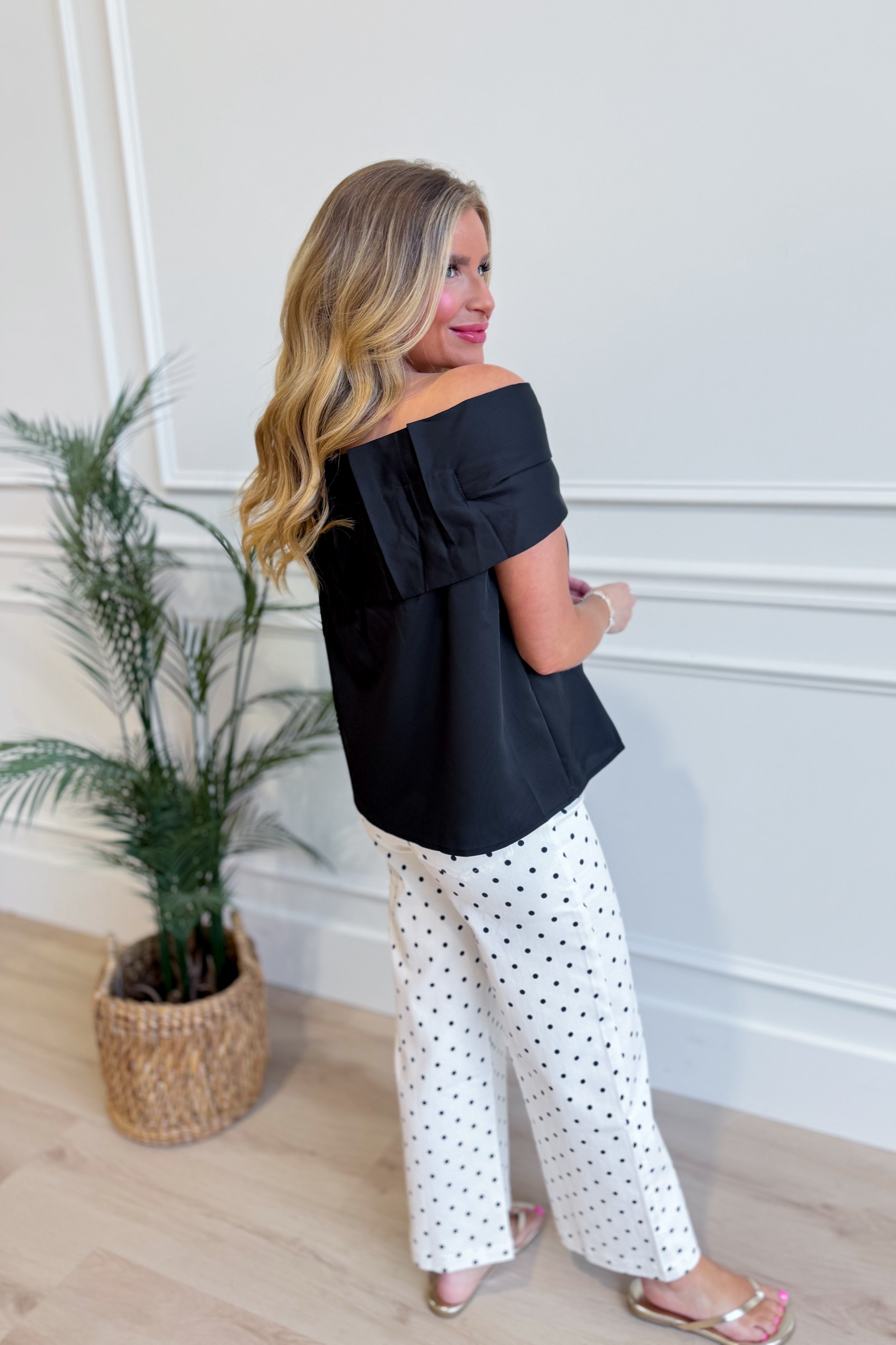 TCEC Oneita bow accented off-the-shoulder top in a dressy style, featuring a bow detail and off-shoulder design.
