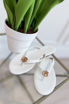 Berness Kellen White Sandal featuring a minimalist strap design and cushioned sole for comfortable wear.