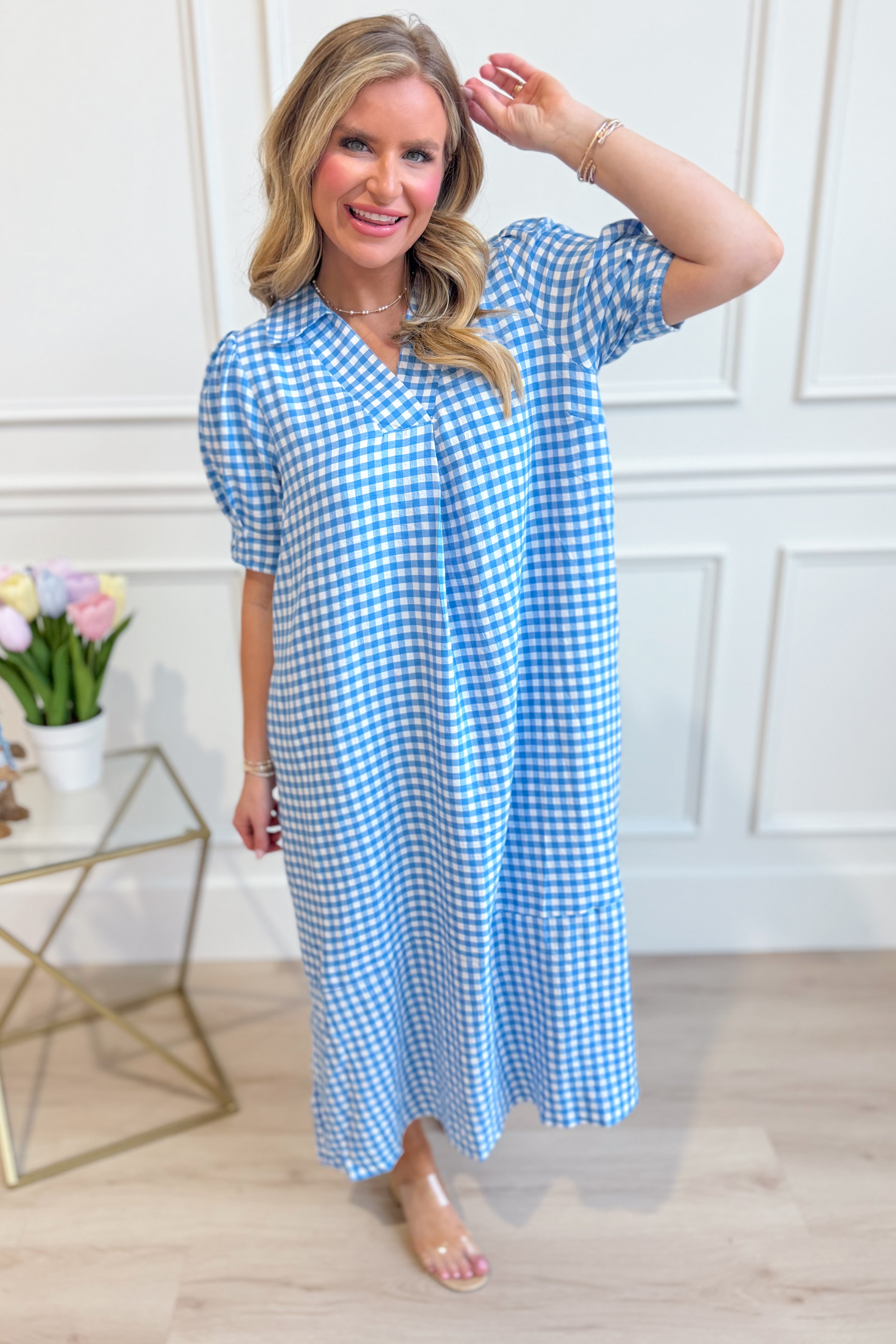 Umgée USA Tonya plaid printed midi dress with long sleeves and a fitted waist, showcasing a stylish and colorful plaid pattern.