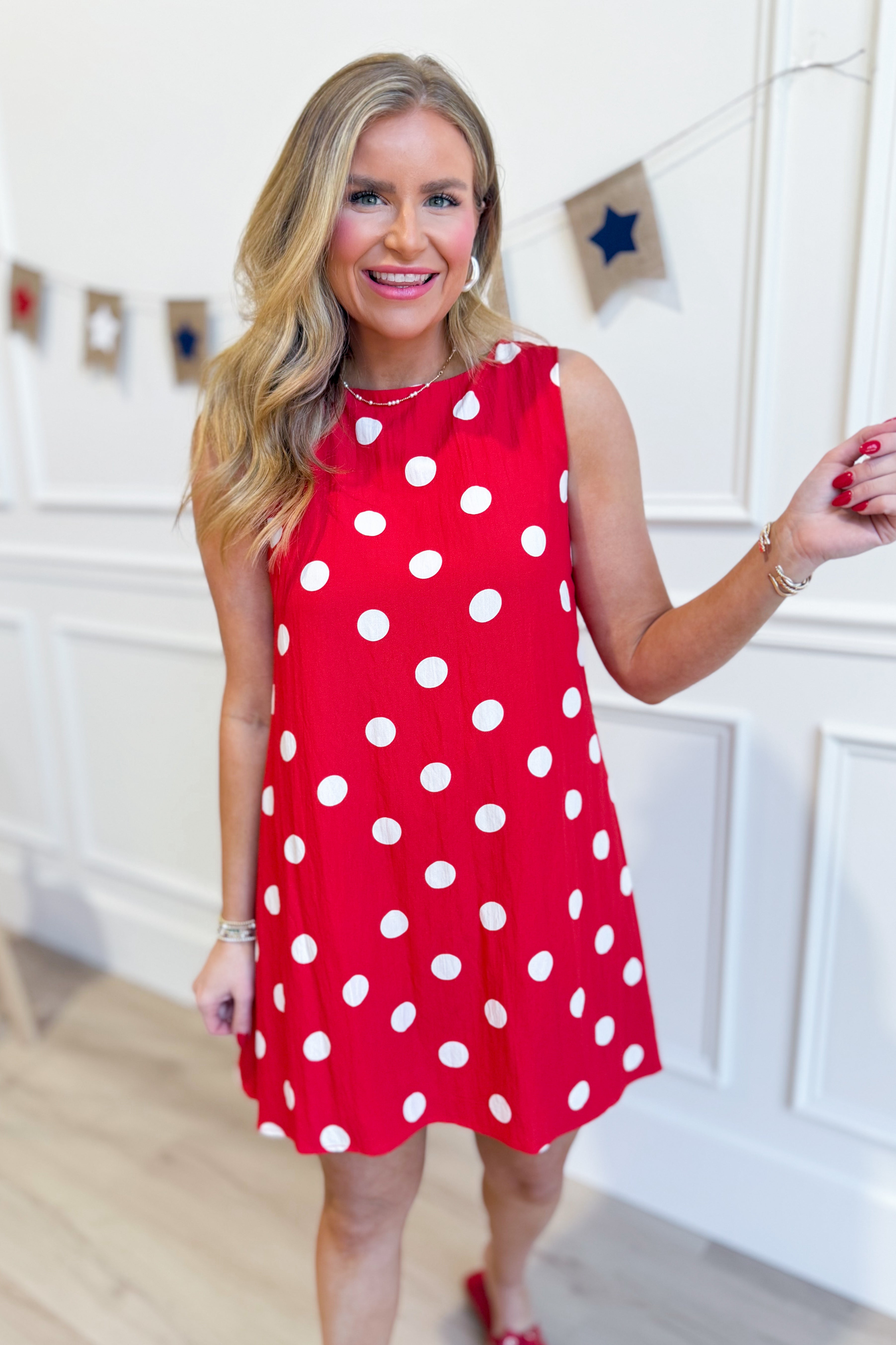 TCEC Gina polka dot sleeveless shift dress with a casual, relaxed fit, featuring a classic polka dot pattern on lightweight fabric.