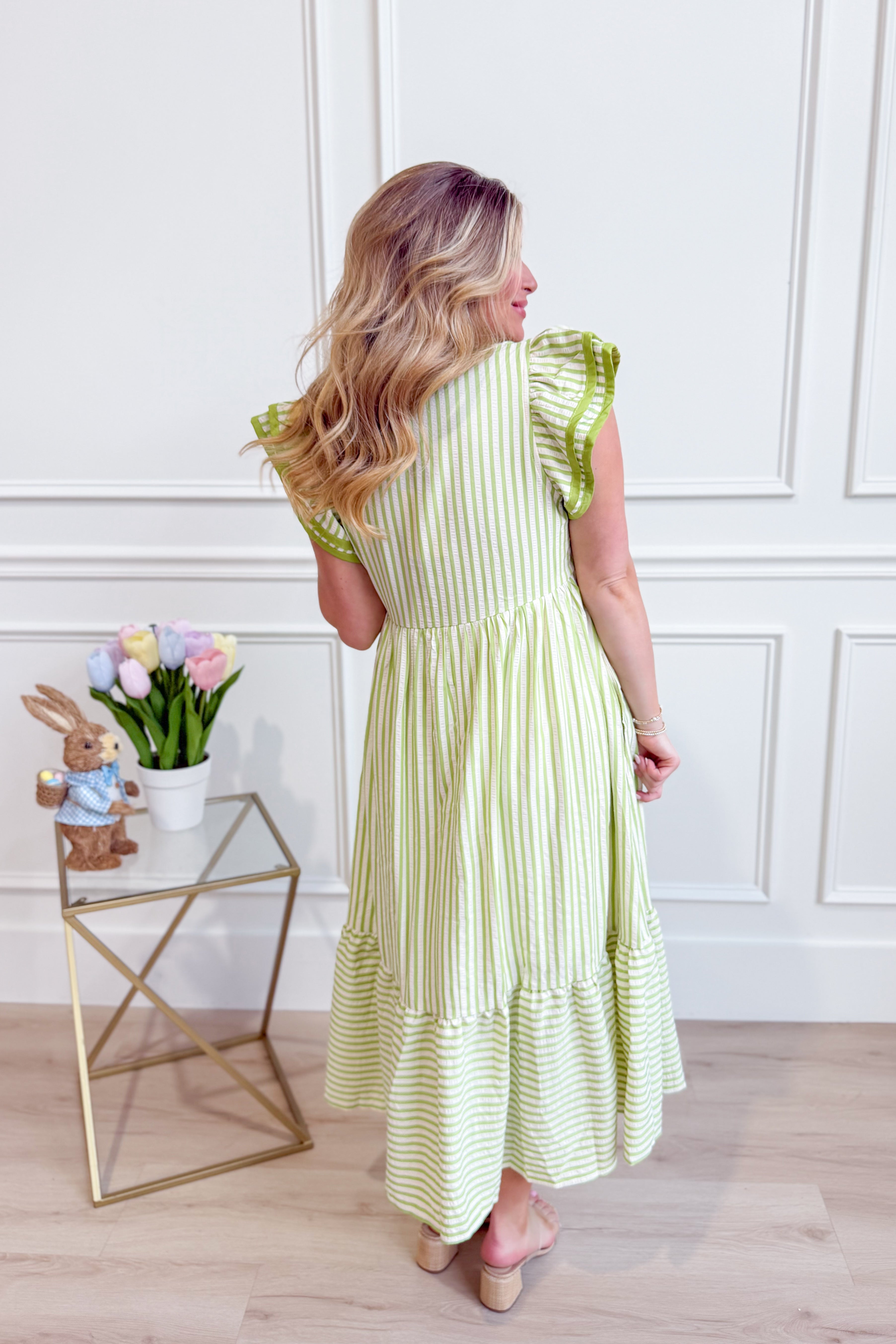 Lacy flutter sleeve solid trim dress by ENTRO, featuring elegant design with flutter sleeves and lace details.