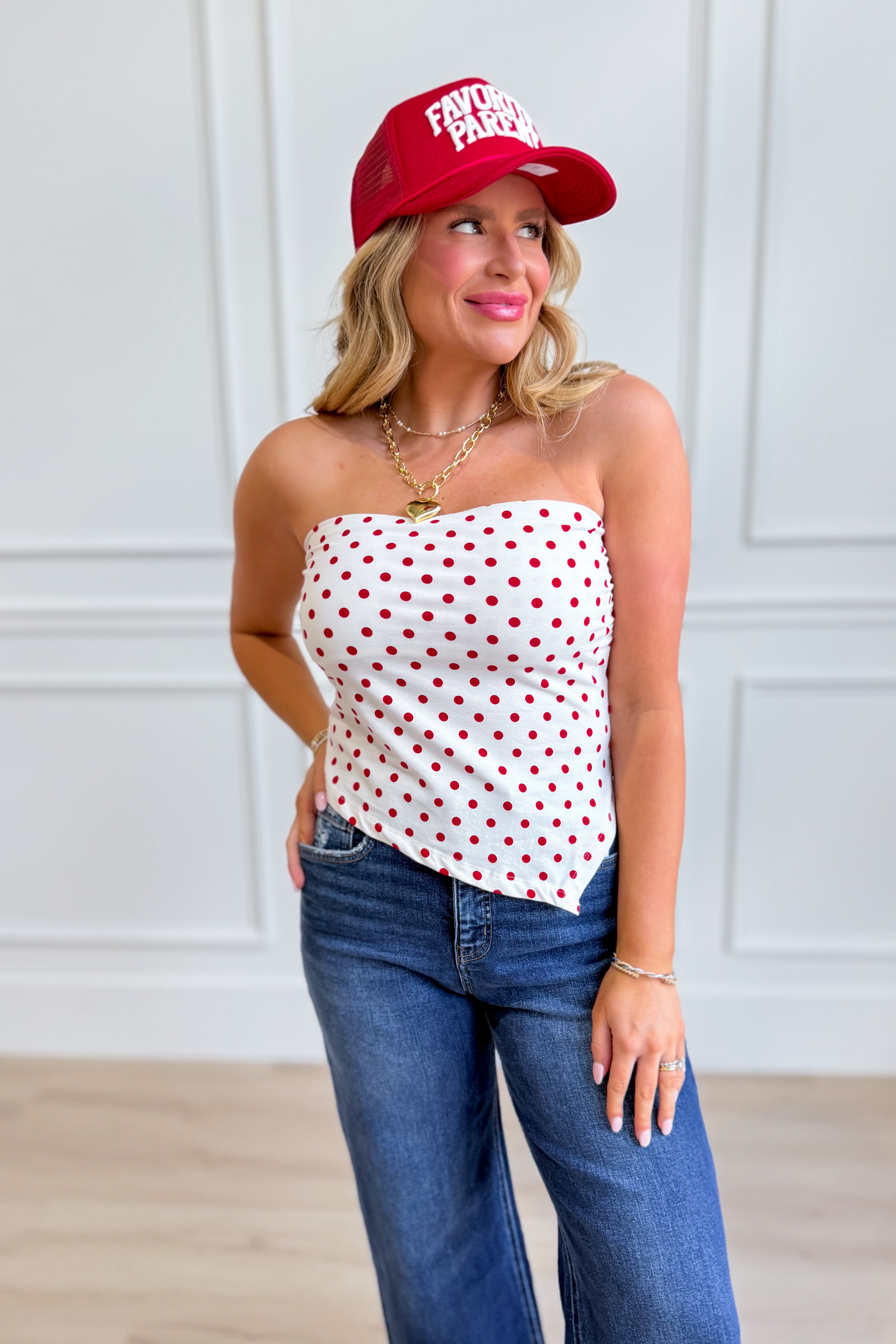 HYFVE Hannah white polka dot triangle tube top, a stylish dressy crop top with polka dot pattern and triangle neckline.