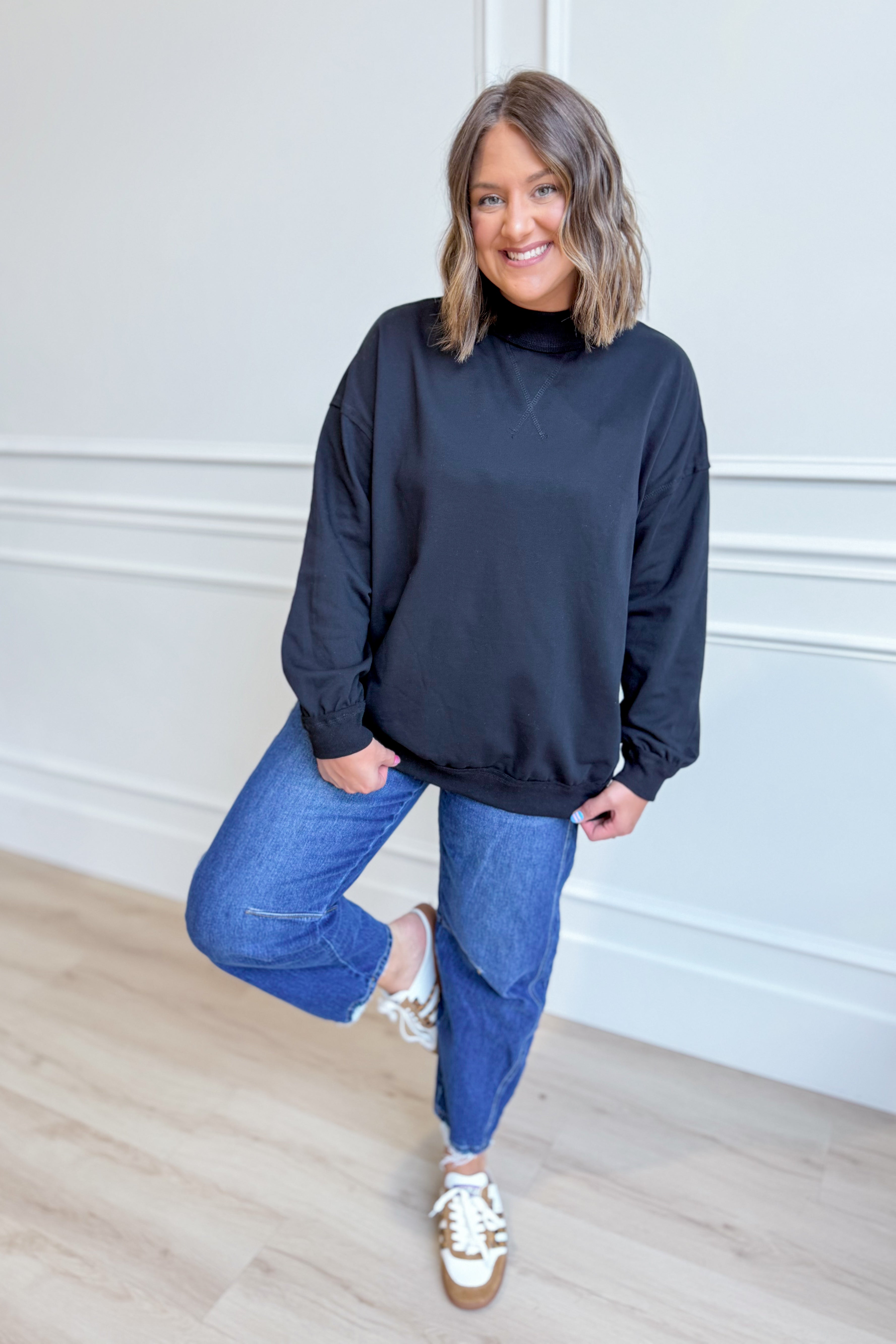 Black Cynthia Game Day Pullover sweatshirt by PEACH LOVE featuring graphic design, casual fit, perfect for game day wear.