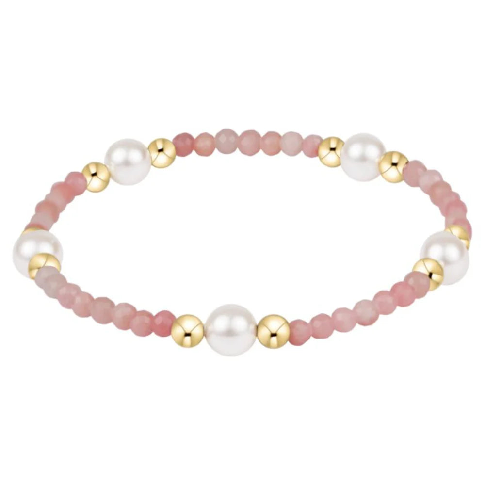 Enewton pink opal purpose pearl gold bracelet featuring 6mm round pink opal beads and gold accents, elegant jewelry accessory.