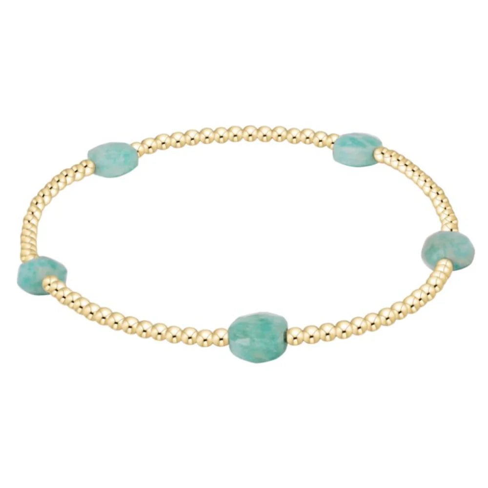 Enewton 2mm Amazonite admire small gem from 222 other jewelry collection, showcasing a vibrant blue-green gemstone.