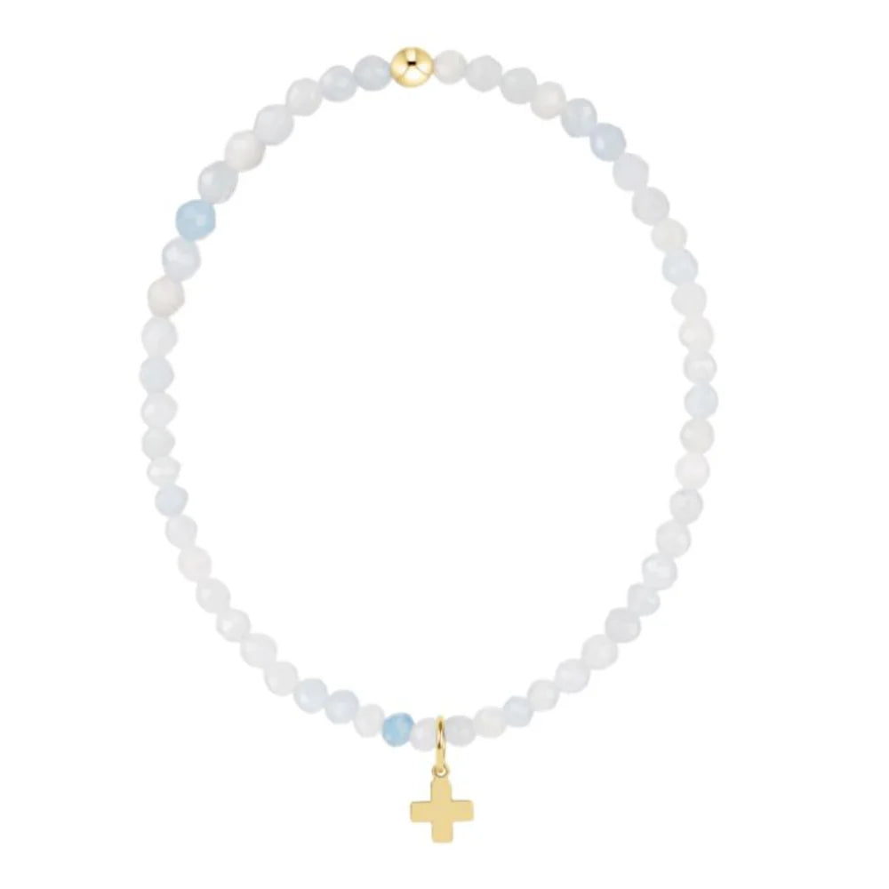 Enewton 3mm aquamarine signature cross gold charm bracelet with classic design, featuring a delicate gold chain and gemstone cross pendant.