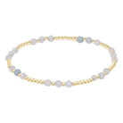 Enewton Aquamarine and gold Joy Gem bracelet with intricate design and gemstone accents, showcasing elegant jewelry craftsmanship.