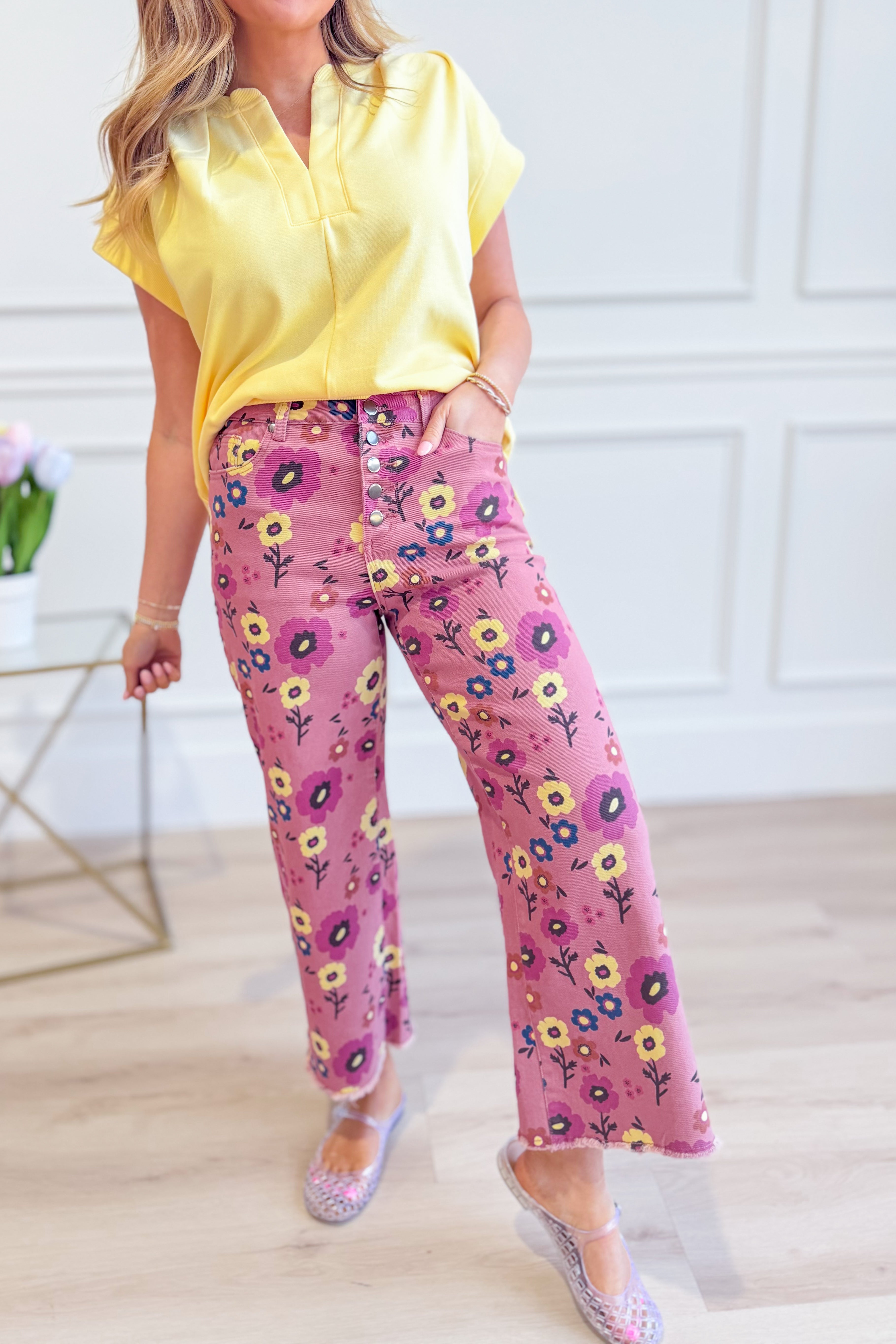 EASEL Eleanor Floral Wide Leg Pants featuring a colorful floral pattern and relaxed wide-leg fit.