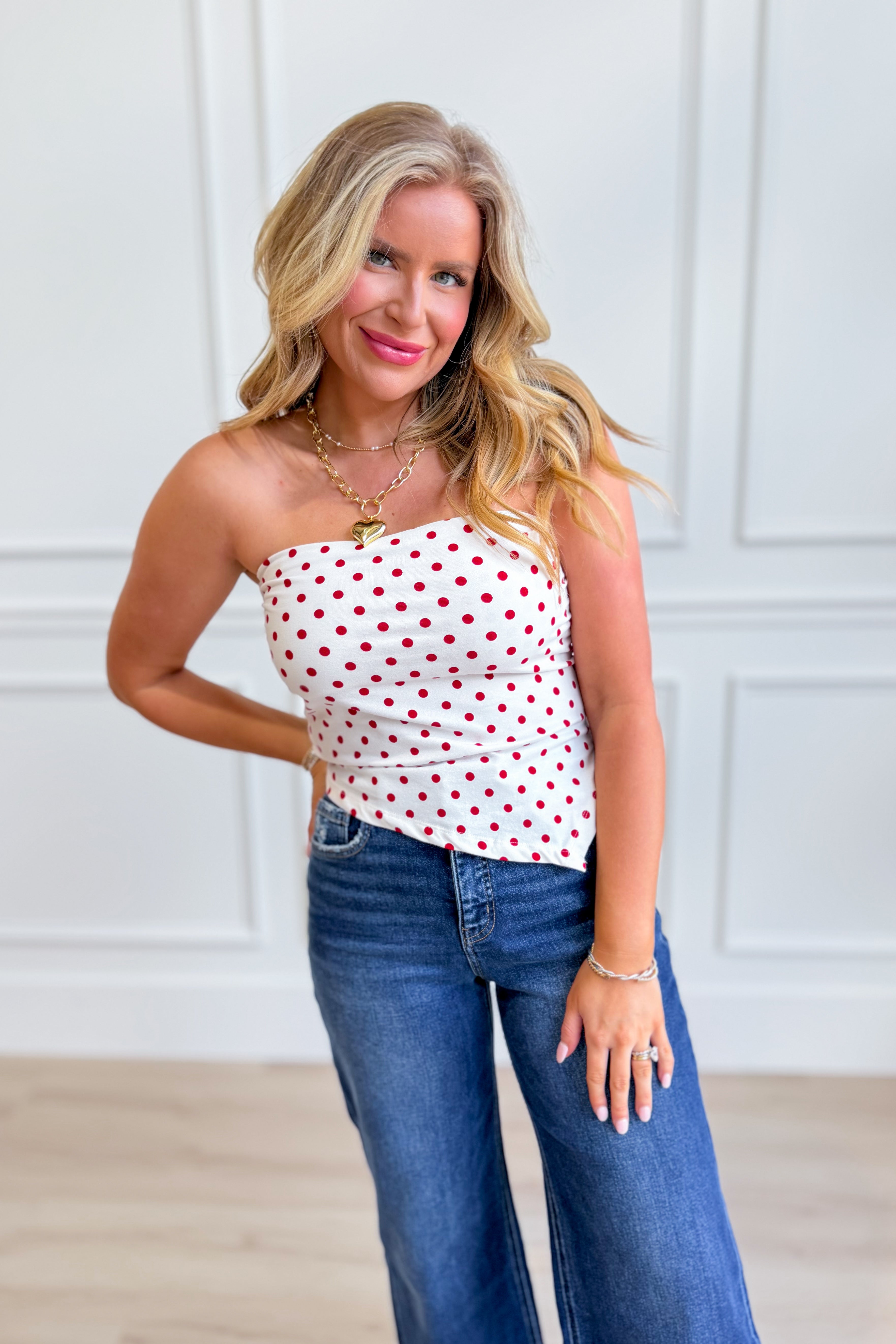 Hannah white polka dot triangle tube top by HYFVE, a stylish 110 dressy crop top with a polka dot pattern and sleeveless design.