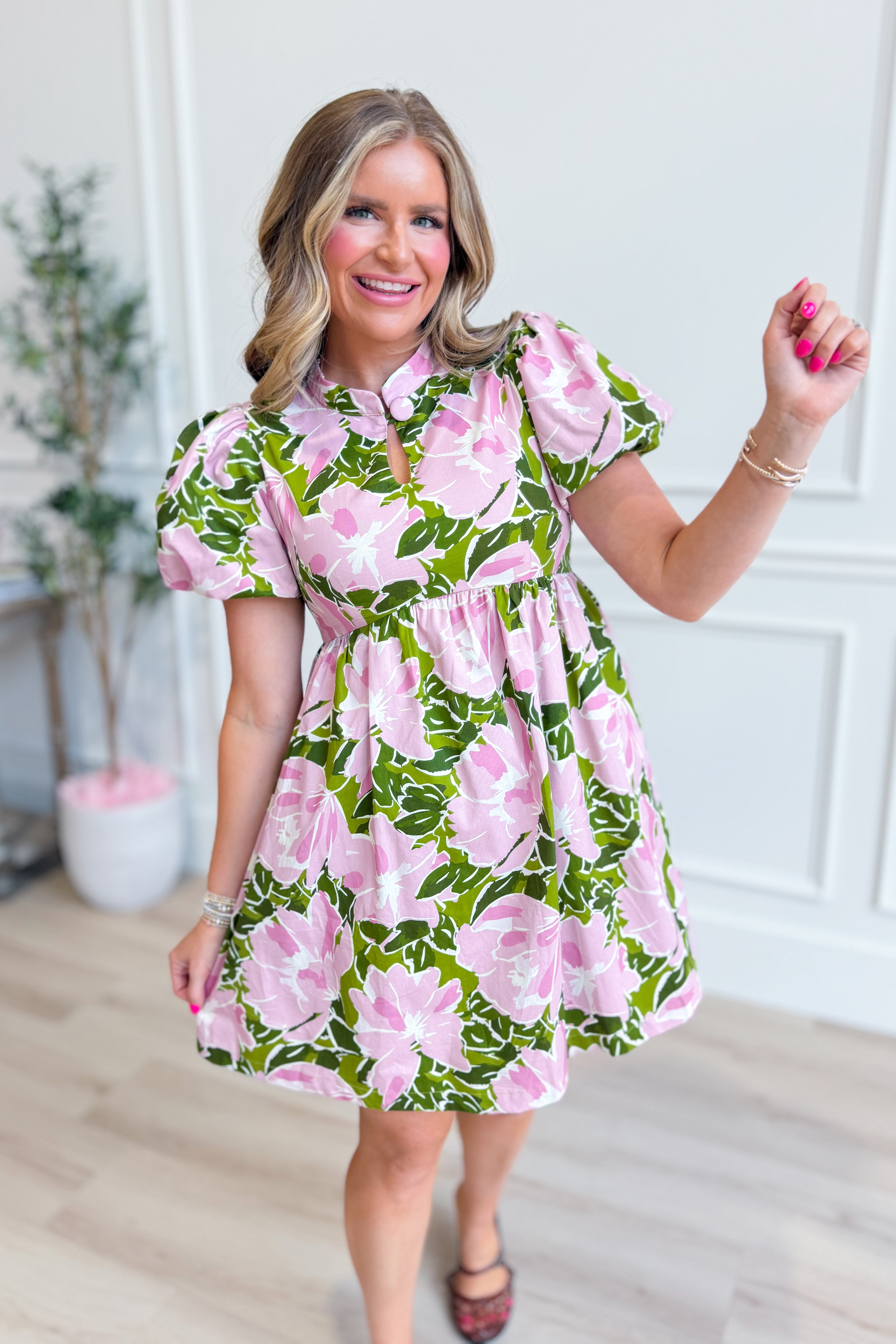 TCEC Fancy floral puff sleeve dress with a fitted bodice and flowy skirt, perfect for dressy occasions.