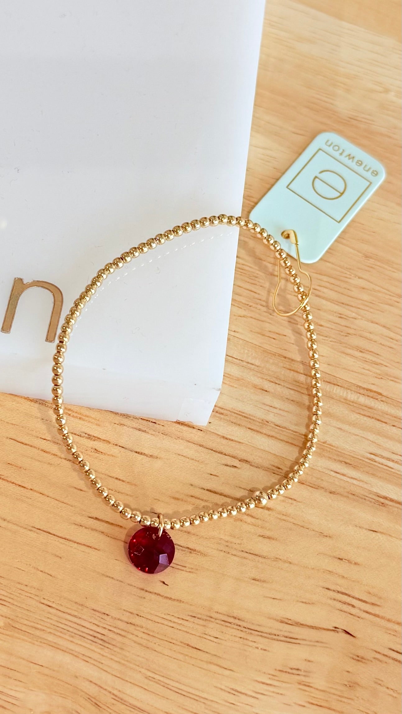 Enewton 2mm classic birthstone bracelet with small round stones and silver chain, showcasing elegant jewelry design.