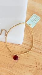 Enewton 2mm classic birthstone bracelet with small round stones and silver chain, showcasing elegant jewelry design.