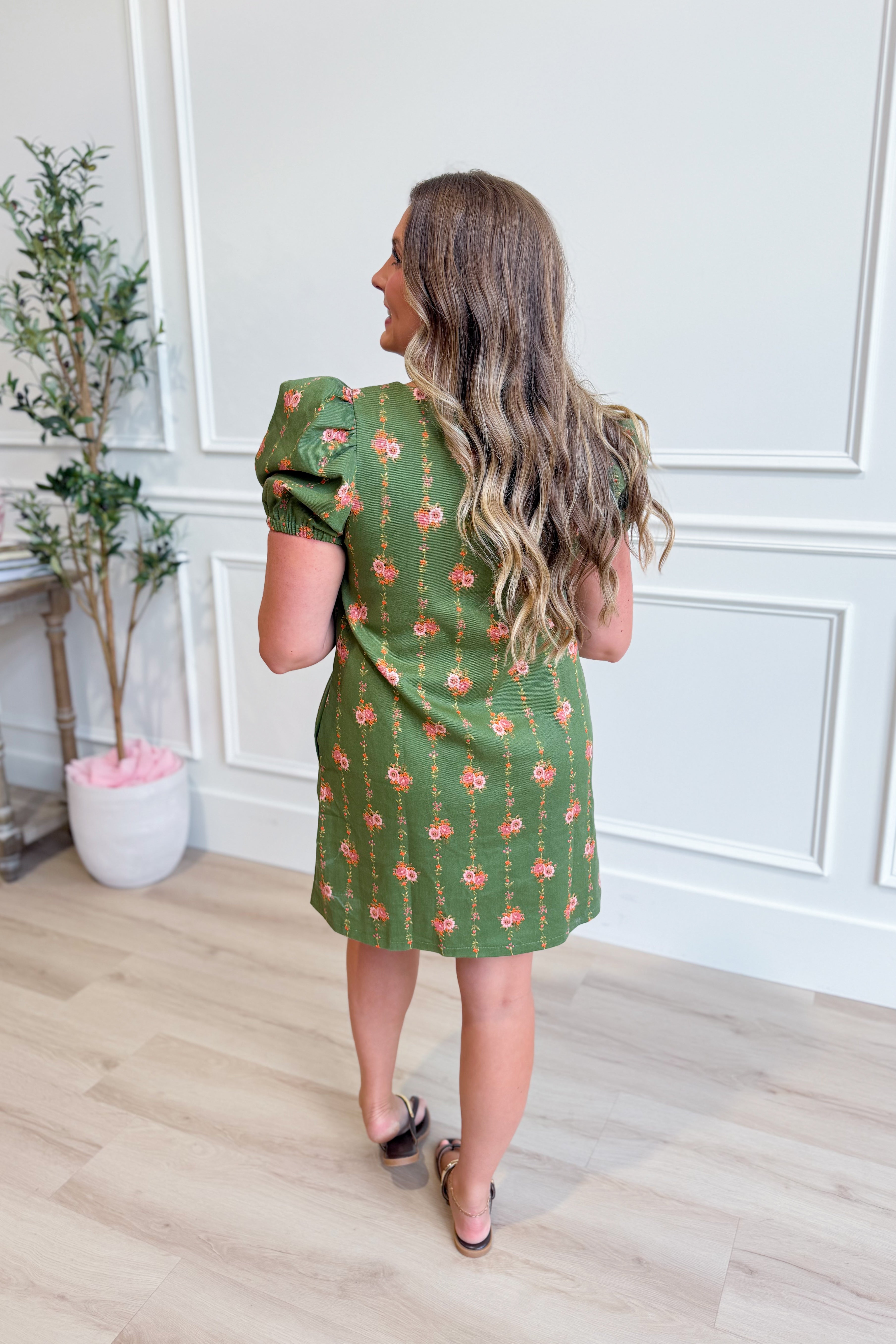 ENTRO Kelly floral button-down dress, 125 dressy dress with a vibrant floral pattern and classic collar, displayed on a hanger.