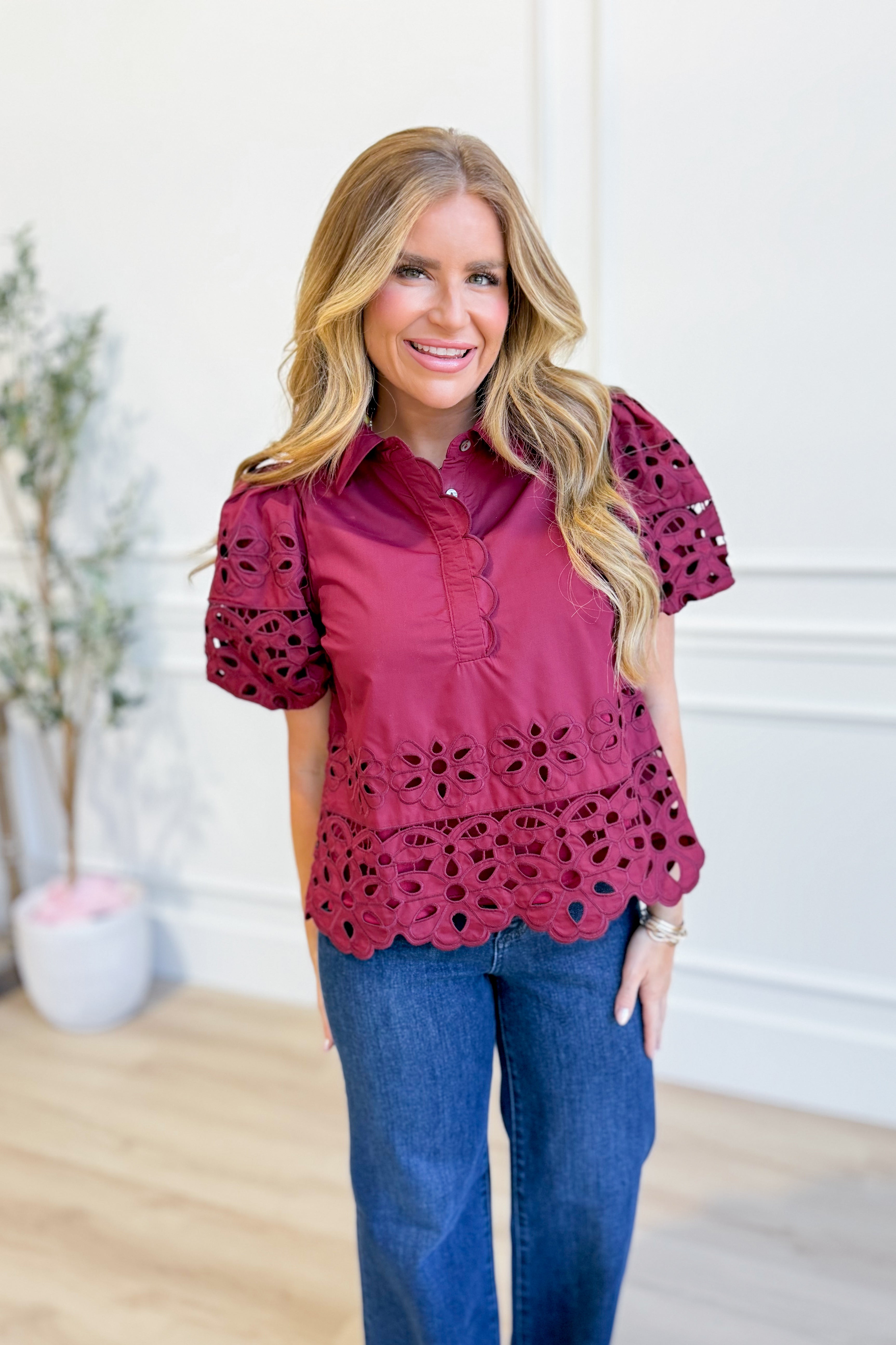ENTRO Reagan eyelet lace detailed dressy top, featuring intricate lace accents and a stylish, elegant design.