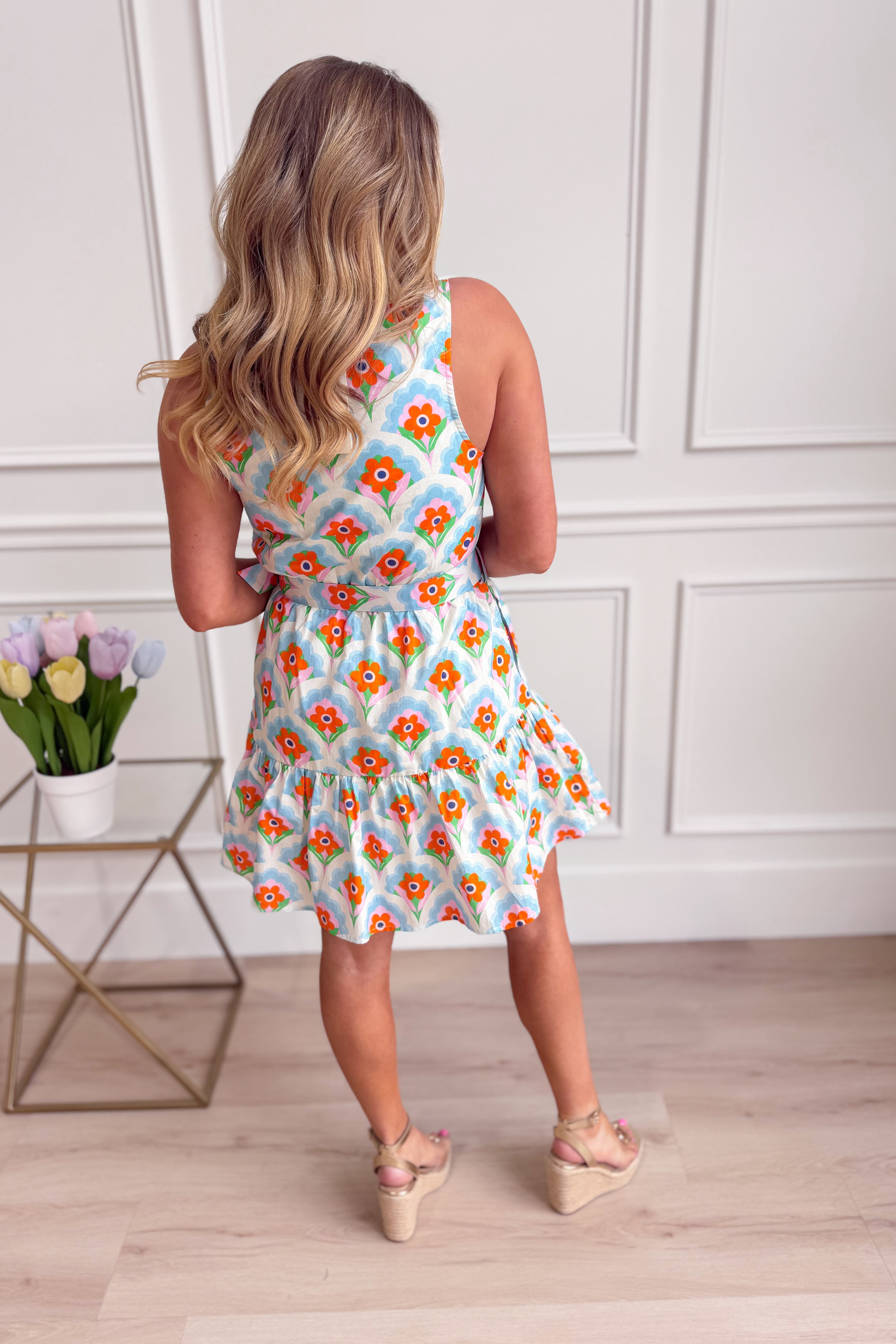 ENTRO Ronnie floral collared dress featuring a vibrant floral pattern and elegant collar, perfect for dressy occasions.