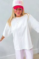 Off white solid relaxed casual top by PEACH LOVE, Cody 105 style, featuring a comfortable, basic design suitable for everyday wear.