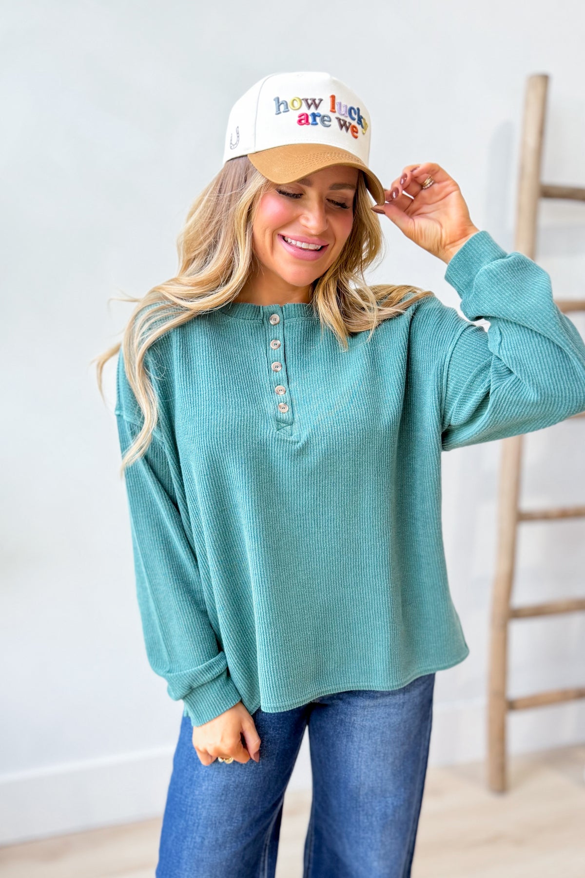 BLU PEPPER Cindy ribbed henley long sleeve top in a casual style, featuring a buttoned neckline and fitted ribbed fabric.
