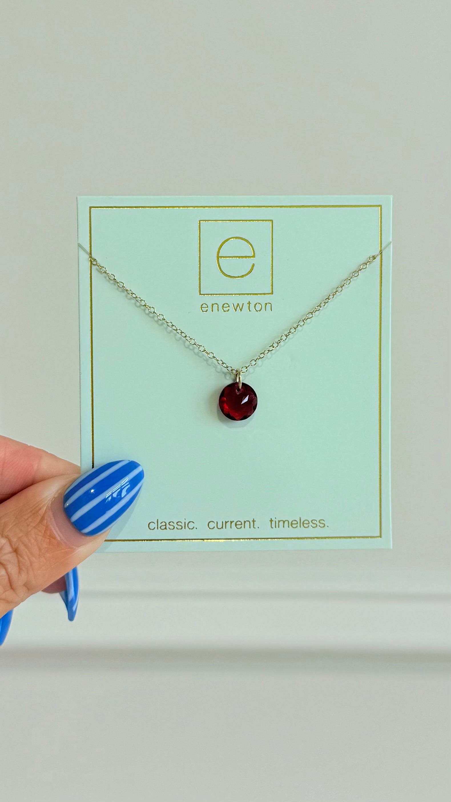 Enewton 16-inch classic birthstone necklace featuring a sparkling gemstone pendant on a silver chain.
