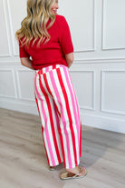 ENTRO Posie Pink Striped Straight Leg Jeans with vibrant pink and white stripes, featuring a classic fit and casual style.