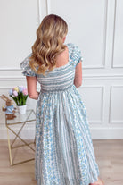 French floral cotton maxi dress by IN LOOM featuring a flowing silhouette and vibrant floral print, perfect for dressy occasions.