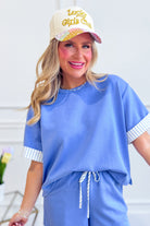 SHE + SKY Oakley Pin Striped Trim Top from the 105 Casual Tops collection, featuring a stylish striped design.