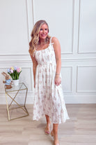 BLU PEPPER Addison floral sleeveless midi dress with a fitted bodice and flowing skirt, perfect for dressy occasions.