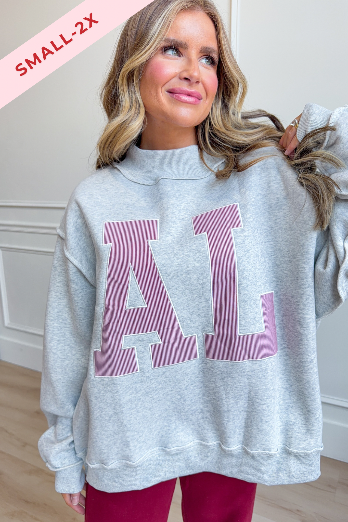 Alabama mock neck embroidered sweatshirt from BUCKET LIST, featuring a graphic design on a cozy 137 sweatshirt style.