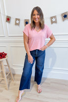 Wasabi & Mint Cindy striped short sleeve casual top with a relaxed fit, featuring colorful horizontal stripes and a round neckline.